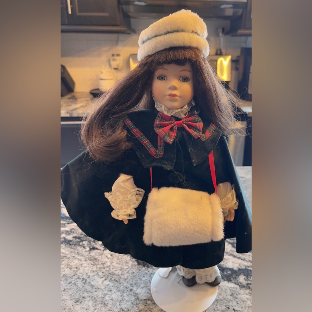 Vintage Christmas Themed Porcelein
Doll W/Hat & Muff 15"